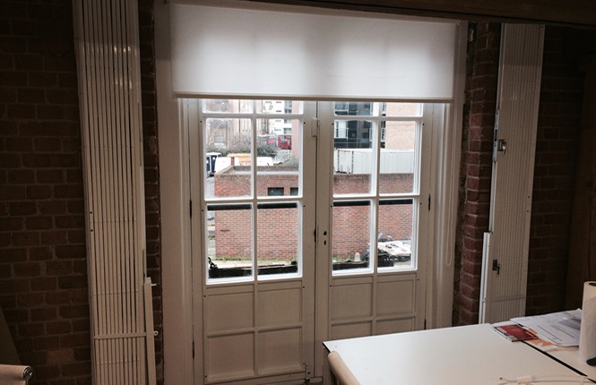 RSG1000 retractable patio door grilles securing an office in London.