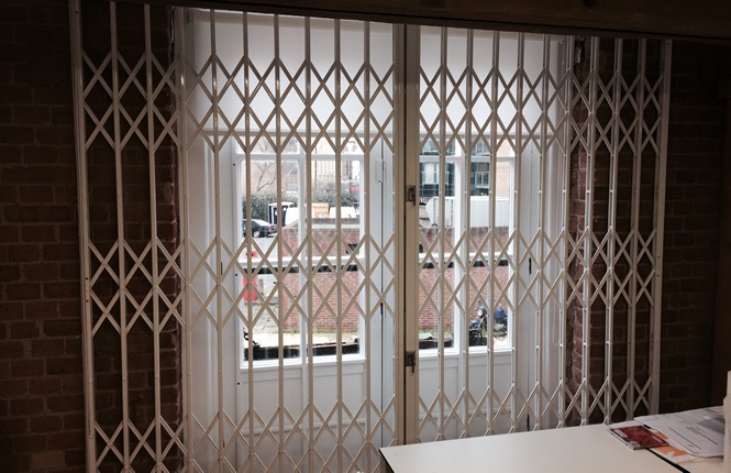 RSG1000 retractable patio door grilles providing security to an office in London.