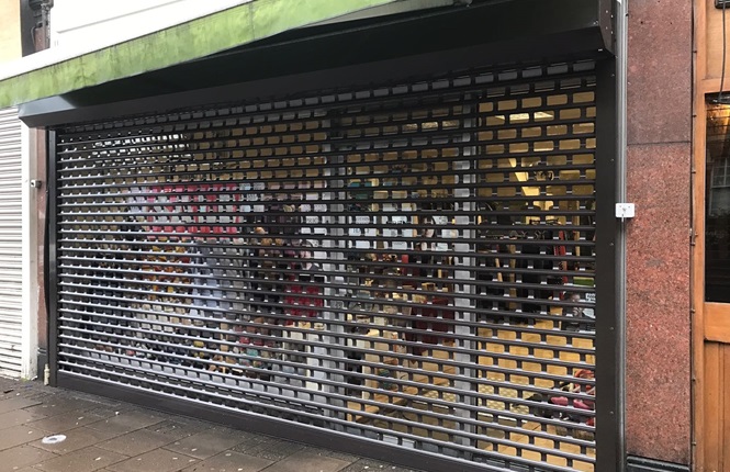 RSG5600 punched roller shutter securing London British Charity.