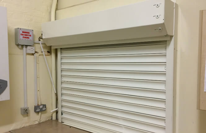 RSG5700 opened fire shutter fitted to the kitchen area inside a London commercial outlet.