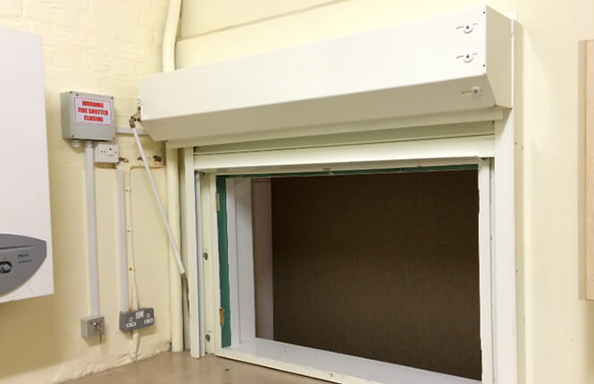 RSG5700 opened fire shutter fitted to the kitchen area inside a London commercial outlet.