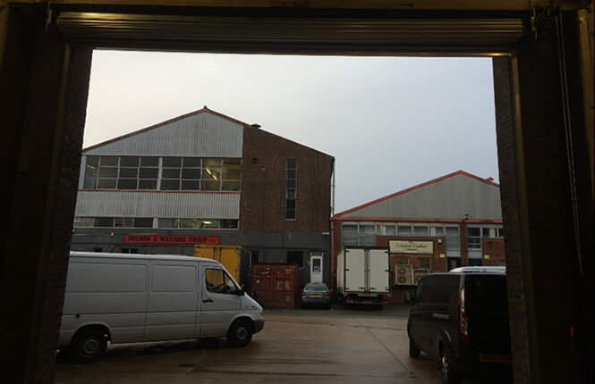 RSG6000 3-Phase opened roller shutter securing factory unit in Kent.