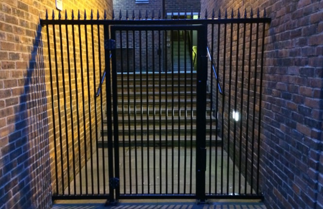 RSG3200 pedestrian gates securing a passageway during out-of-hours in London.