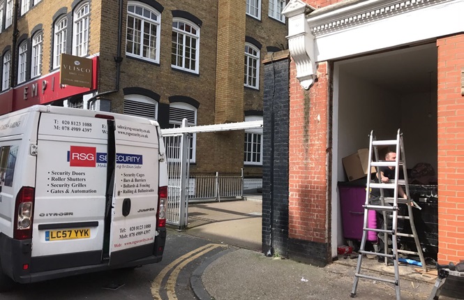 Our installation team working on the fitting of our RSG8200 fully louvred bin store door on residential apartments near Liverpool St Station.